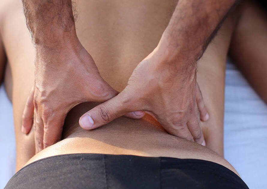 Therapeutic massage stroke on the back